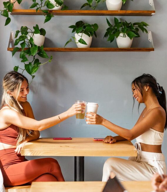 Girls drinking coffee at a local coffee shop in Gainesville, FL