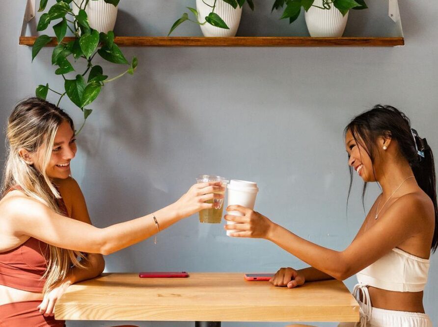 Girls drinking coffee at a local coffee shop in Gainesville, FL